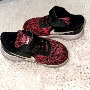 Pink and black toddler girls Nike tennis shoes